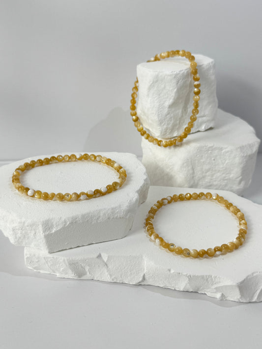 Yellow shell bracelet – “If you seek joy, creativity, and inner lightness”